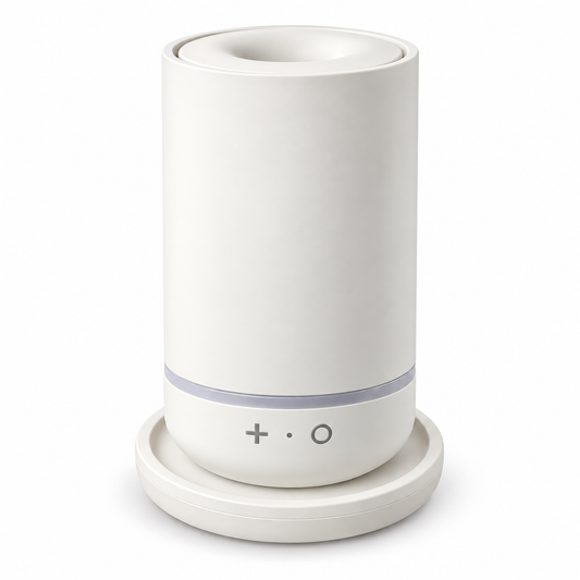 Ivory eissomisha 360° cordless essential oil diffuser on its matching charging dock, white background
